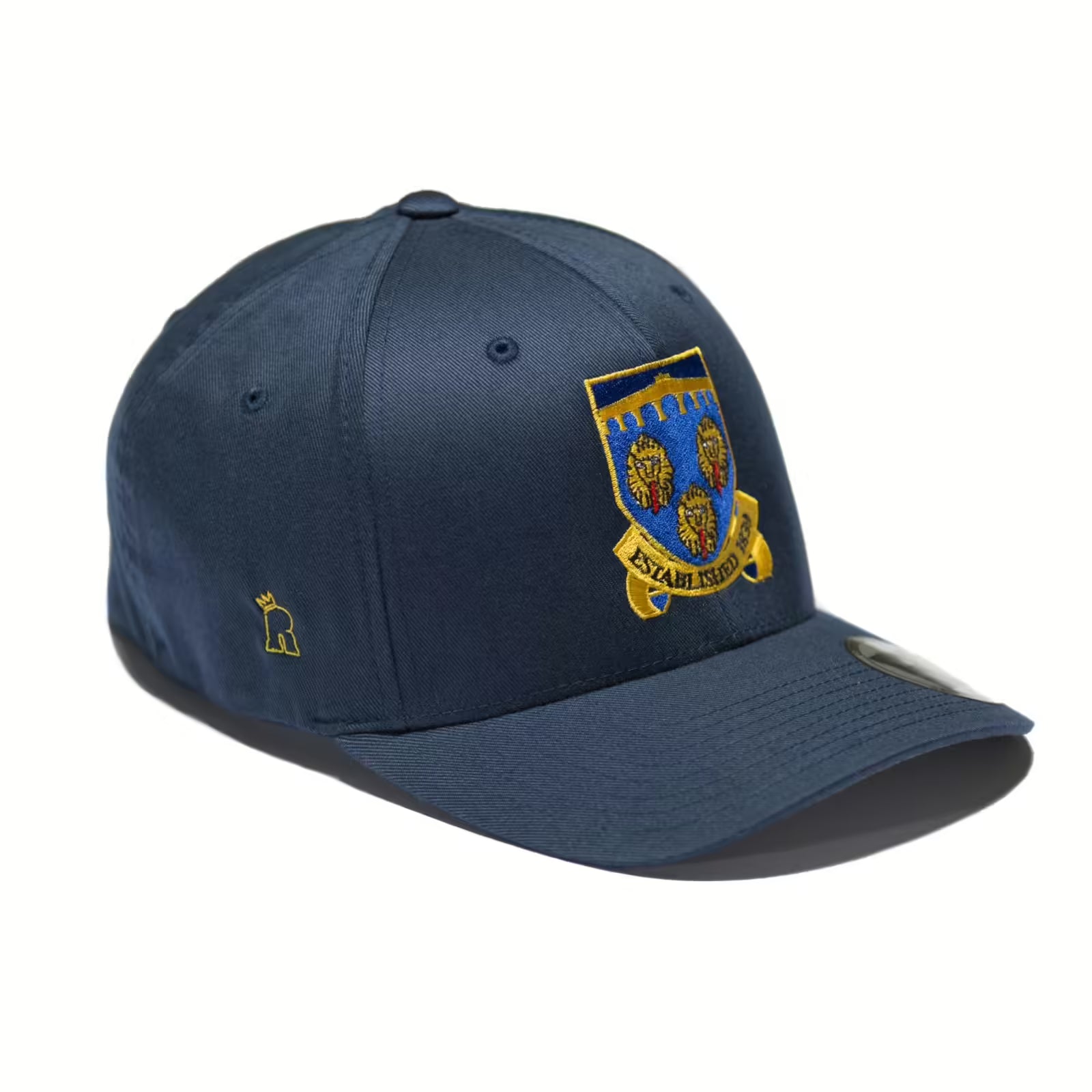 Rex Club | The Rex Club Shrewsbury CC stretch-fit navy cap features an embroidered crest with three golden roses, a yellow "Established 1864" banner on the front, and a small gold crown logo on the side to honor Shrewsbury Cricket Club. | Custom Caps | Custom Hats | Team Headwear | UK
