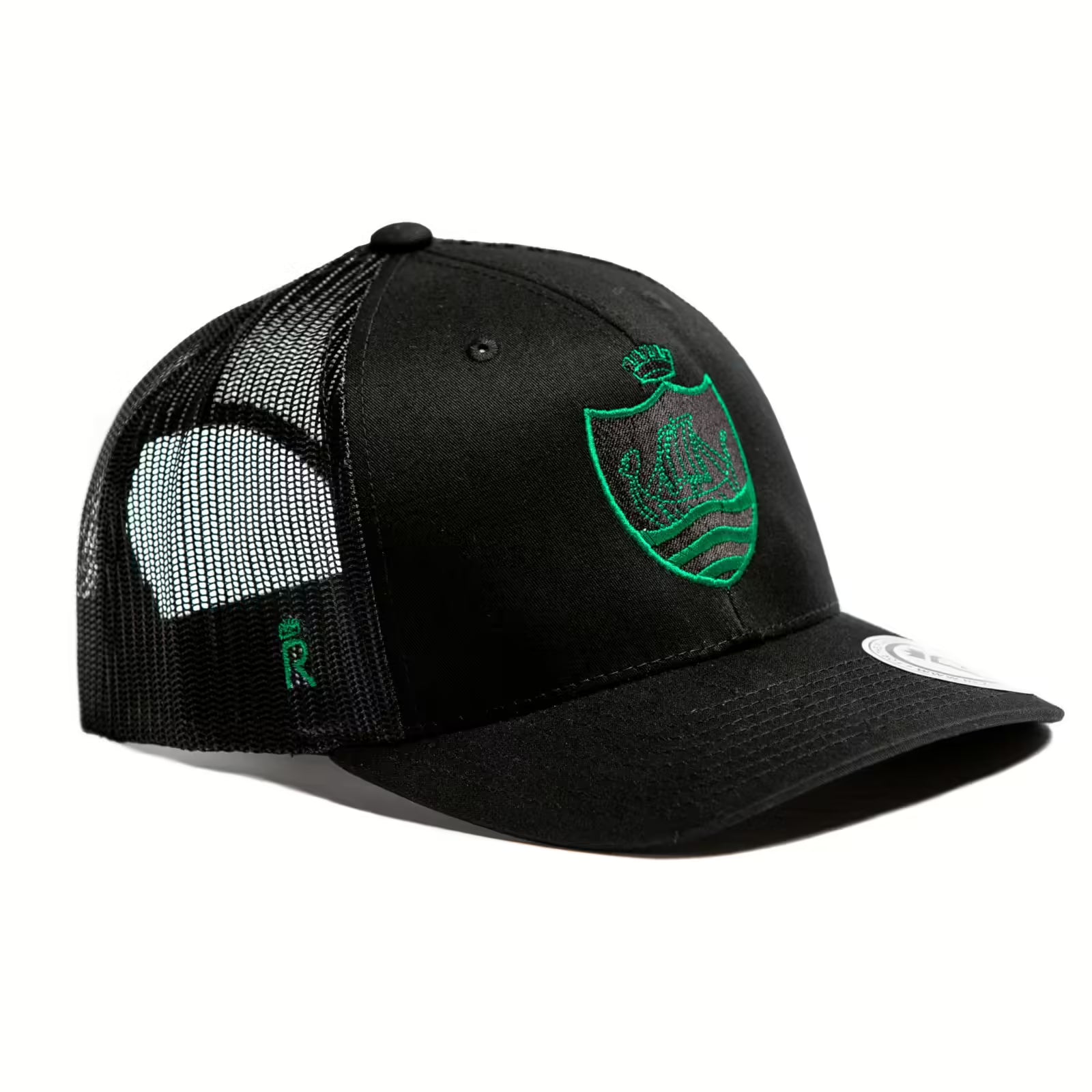 Rex Club | The Rex Club Sidmouth RFC Trucker is a black hat with a green embroidered Sidmouth RFC crest, curved brim, black mesh sides and back, white visor sticker, and comes in One Size Fits Most. | Custom Caps | Custom Hats | Team Headwear | UK