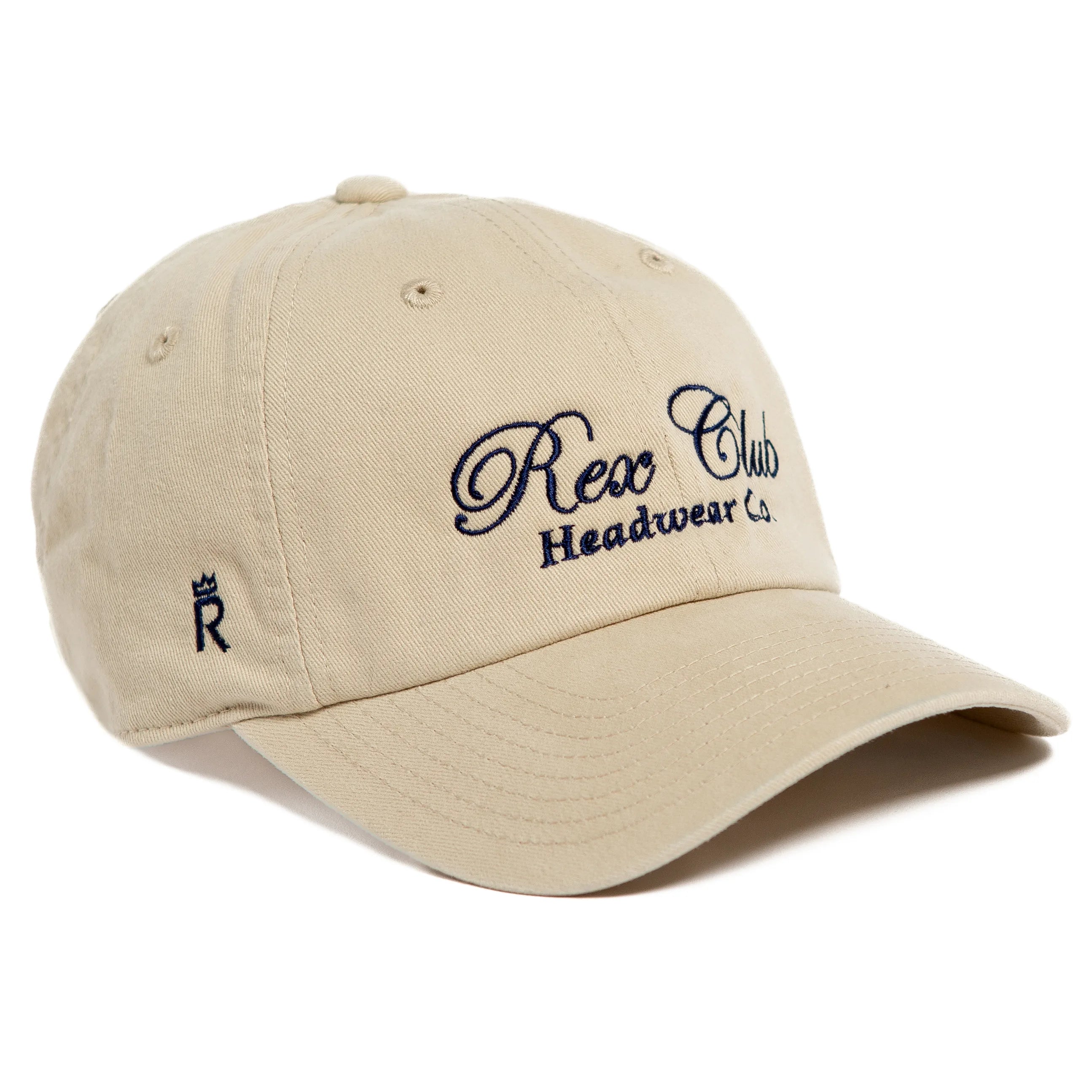 Rex Club | The Rex Club Headwear Co. - Sand cap by Rex Club features "Rex Club Headwear Co." in dark blue script on the front and a small blue crown logo on the side. | Custom Caps | Custom Hats | Team Headwear | UK