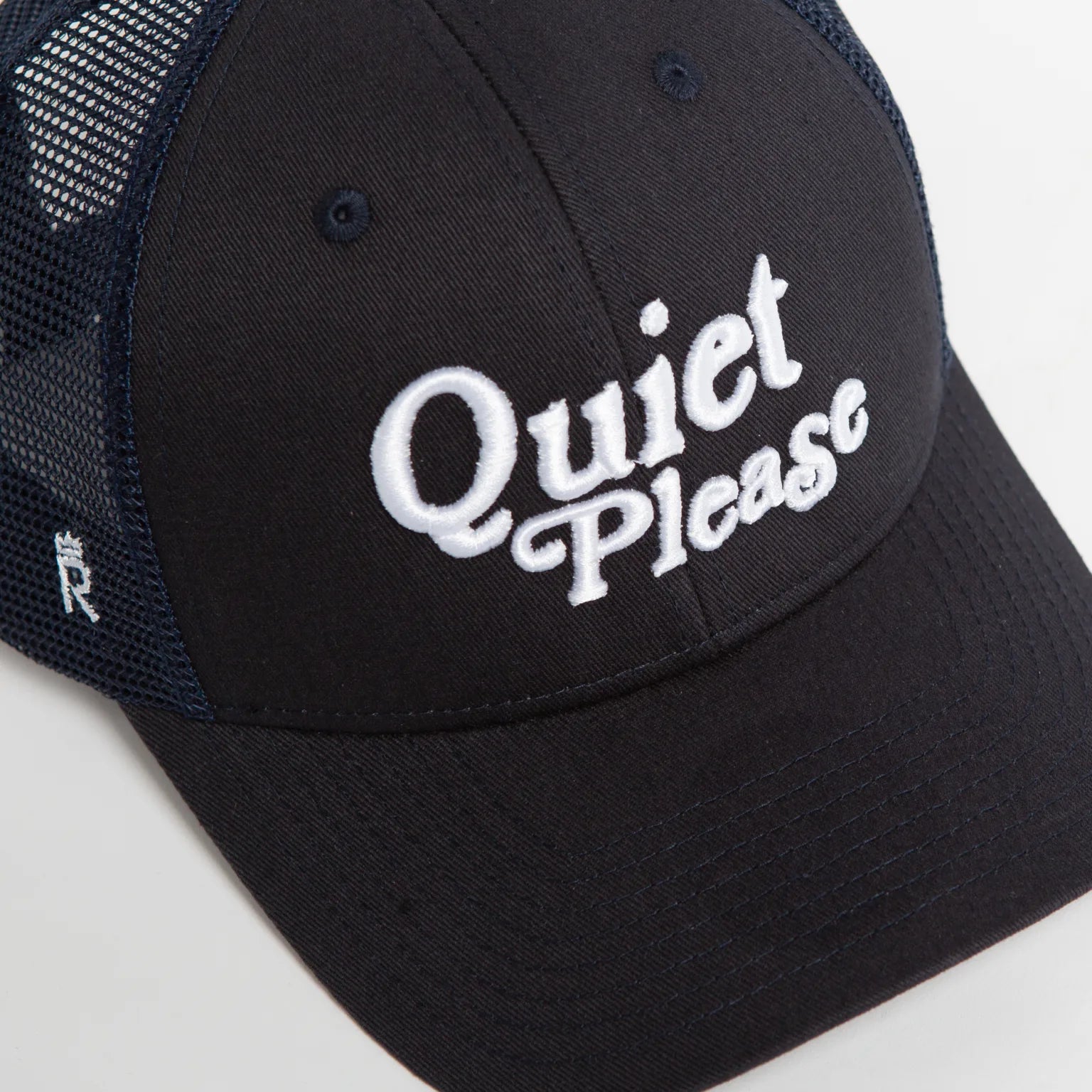 Rex Club | The Golf: Quiet Please - Navy Trucker hat by Rex Club offers a classic trucker cap style, featuring white mesh sides and "Quiet Please" embroidered in white on the front, making it a timeless addition similar to your favorite navy trucker cap. | Custom Caps | Custom Hats | Team Headwear | UK