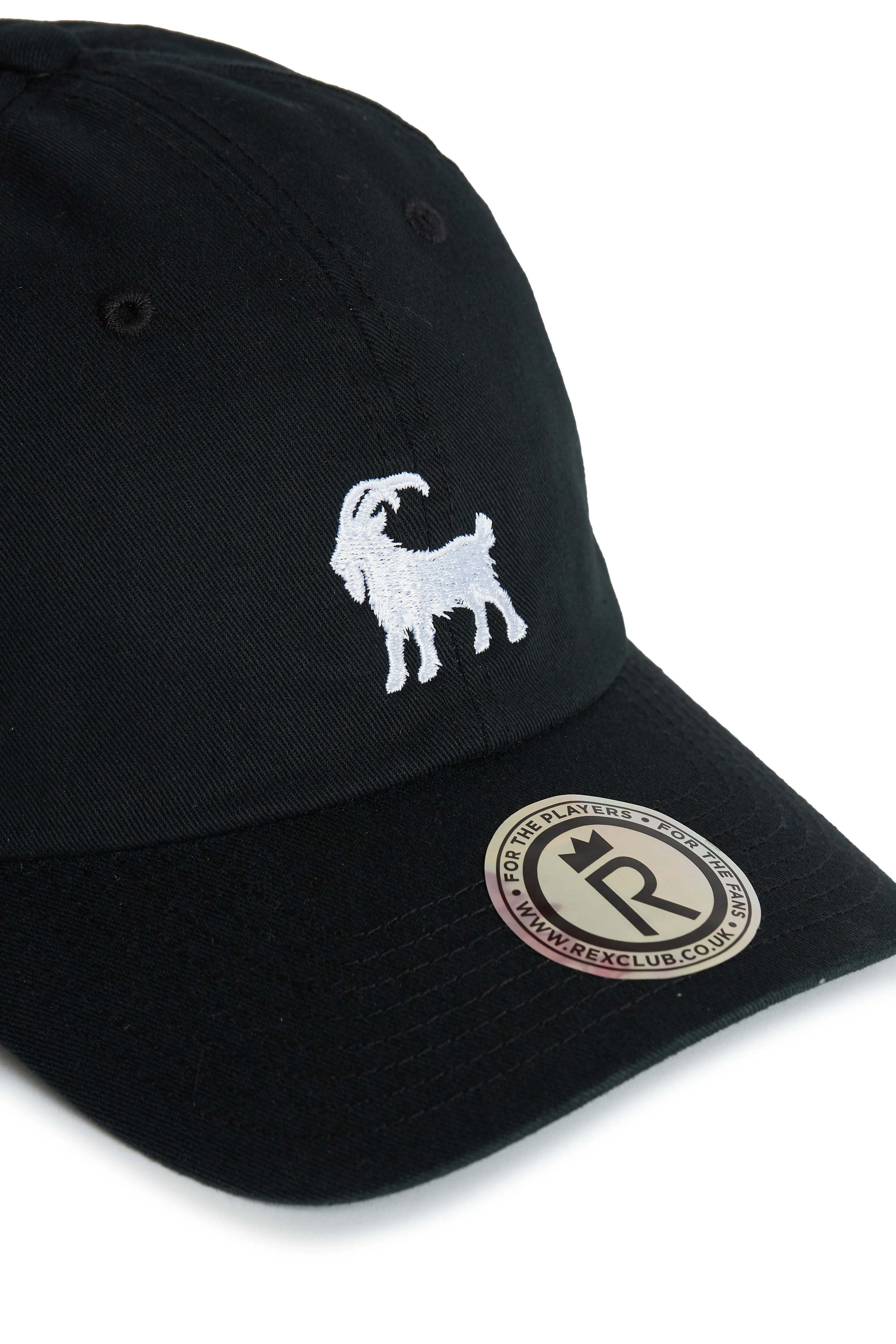 Rex Club | The Rex Club Goat - Black cap features a white embroidered goat on the front and a round "REXCLUB.COM" sticker on the brim. | Custom Caps | Custom Hats | Team Headwear | UK