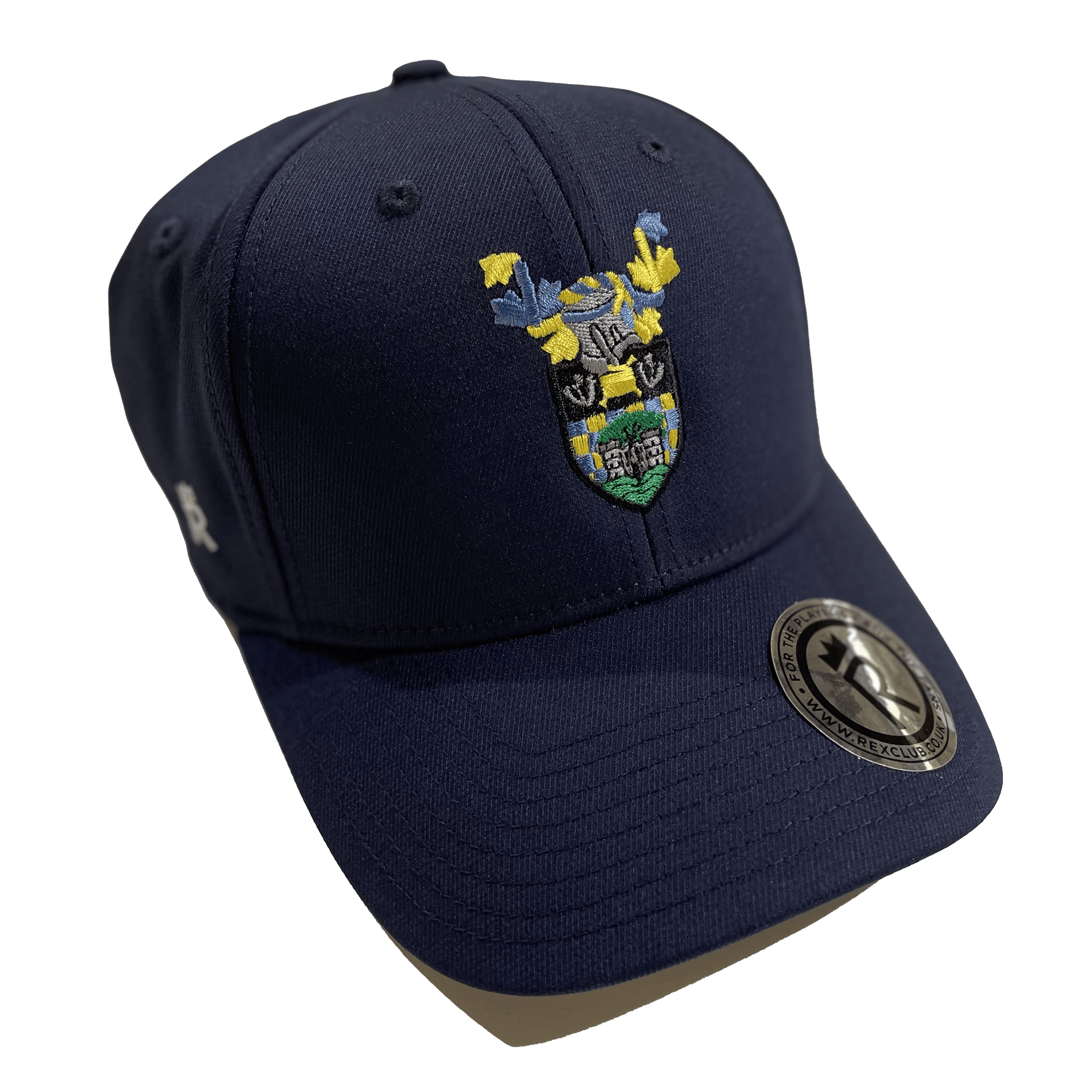Rex Club | The Rex Club Reigate Priory Cricket Club cap is a navy stretch-fit baseball cap with an embroidered multicolored crest on the front and a round black sticker with silver details, made from a durable polyester-cotton-spandex blend. | Custom Caps | Custom Hats | Team Headwear | UK