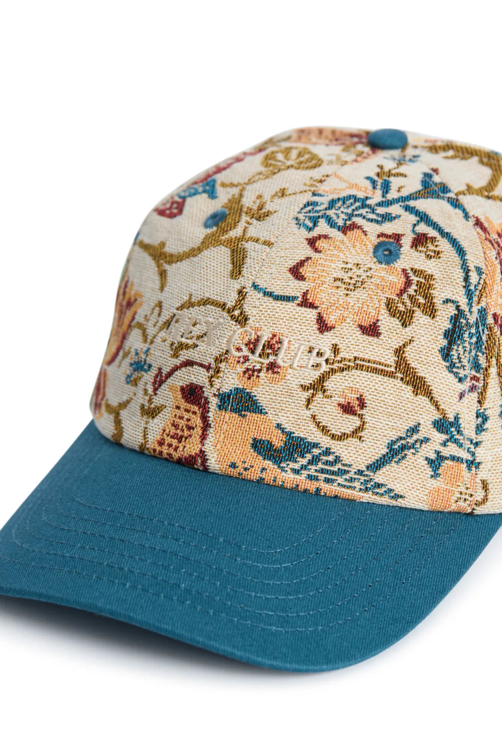 Rex Club | The Rex Club "A New Day" baseball hat features a teal brim and a tapestry-style floral crown in blue, orange, gold, and red. "Gallery" is embroidered in white on the front for a bespoke touch. | Custom Caps | Custom Hats | Team Headwear | UK variant-1