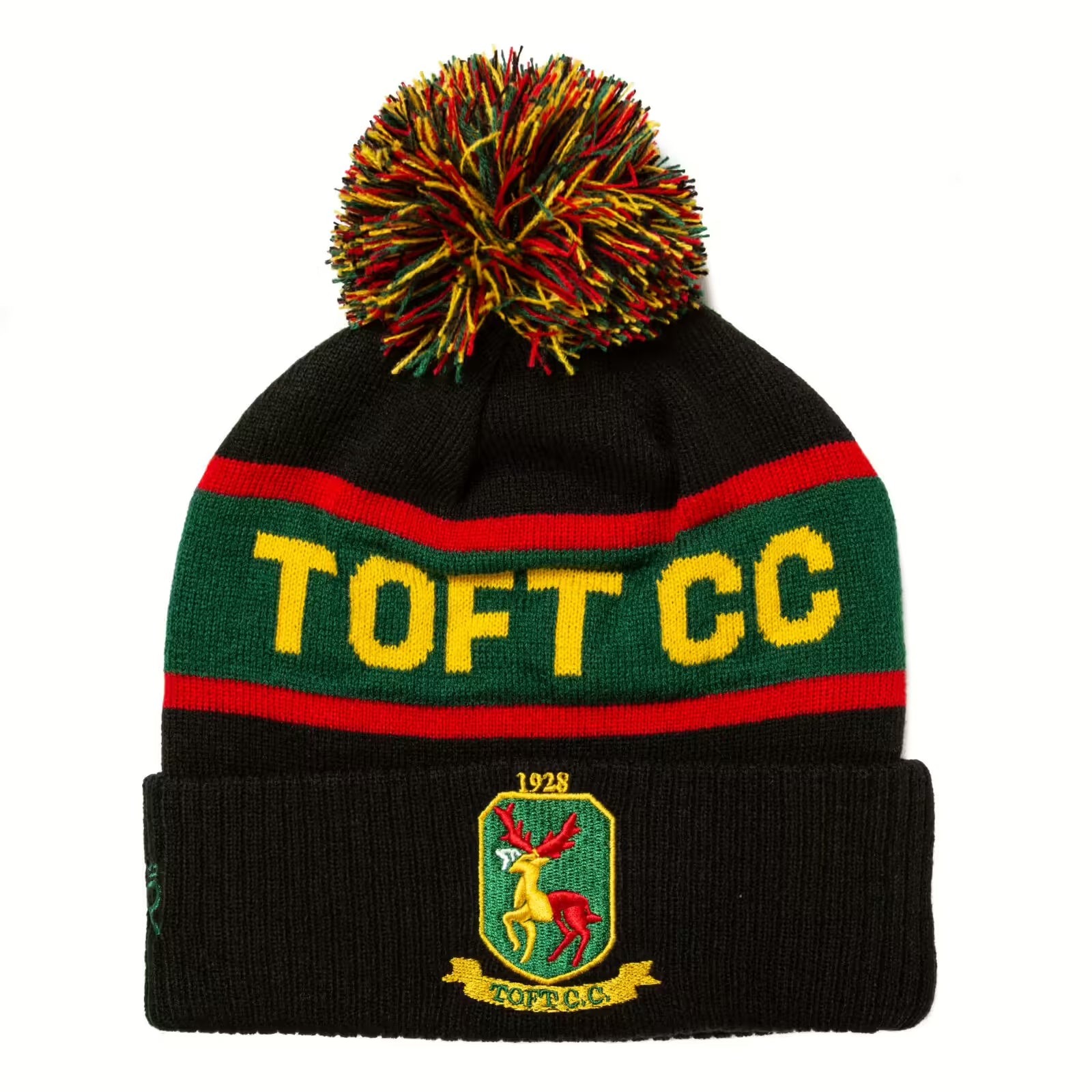 Rex Club | The Rex Club Toft CC Bobble Hat is black with red and green stripes, a multicolored pom-pom, "TOFT CC" in yellow, and a patch showing a deer and "1928 TOFT C.C."—ideal for National T20 or Cheshire league Cricket fans. | Custom Caps | Custom Hats | Team Headwear | UK