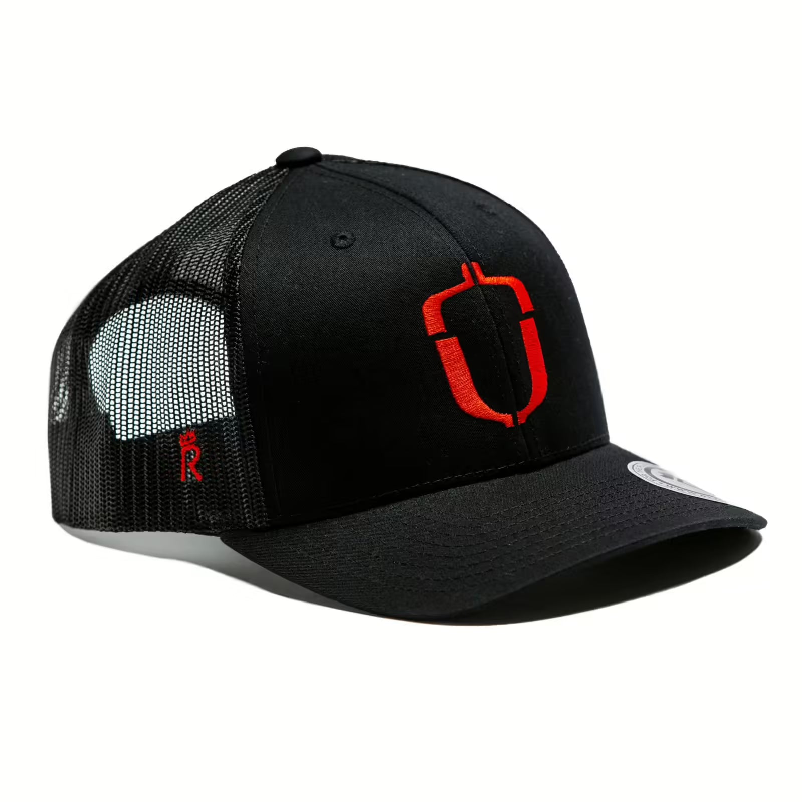 Rex Club | The Hartpury Rugby Trucker by Rex Club is a black hat with a red and white embroidered Hartpury Rugby logo, curved bill, small red side detail, structured crown, and snapback closure—ideal for any fan. | Custom Caps | Custom Hats | Team Headwear | UK