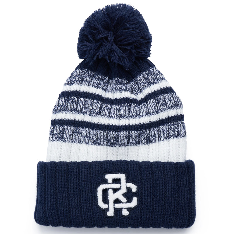 Rex Club | The Rex Club - Navy/White beanie features white and navy stripes, a navy fold-over brim, a navy pom-pom on top, and a chenille "RC" patch embroidered on the front. | Custom Caps | Custom Hats | Team Headwear | UK