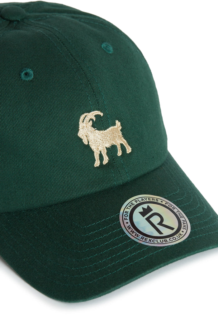 Rex Club | The Rex Club Goat - Dark Green cap features an embroidered gold goat on the front and a round brim sticker with "REXCLUB.CO.UK" and "FOR THE PLAYERS. | Custom Caps | Custom Hats | Team Headwear | UK