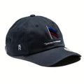 Rex Club | The Uppingham Rovers Slouch by Rex Club is a black baseball cap with an embroidered flag-like design in blue, red, and black, "Solvitur Ambulando" text below, and a small white crowned "R" on the side. | Custom Caps | Custom Hats | Team Headwear | UK