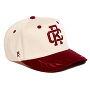 Rex Club | The Rex Club RC - Victor - Two Tone is a cream cotton baseball cap with a burgundy brim, embroidered leaf design, burgundy letters on the front, matching button and eyelets. One size fits most. | Custom Caps | Custom Hats | Team Headwear | UK