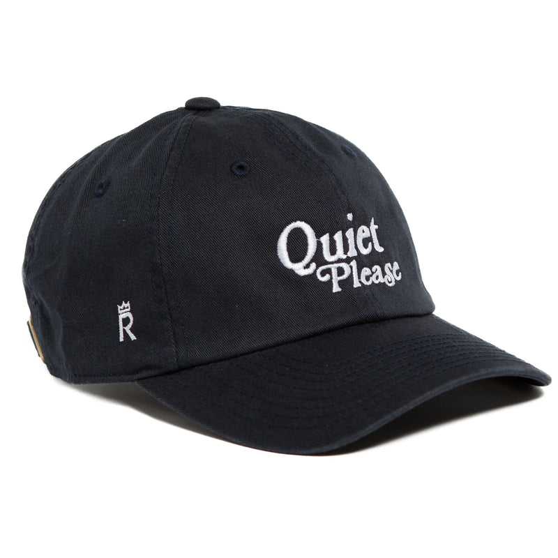 Rex Club | A navy slouch baseball cap by Rex Club with "Quiet Please" embroidered in white on the front and a small crowned "R" on the side. | Custom Caps | Custom Hats | Team Headwear | UK