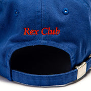 Rex Club | Close-up of the back of the OFFSEASON 23 Slouch by Rex Club, a blue 100% cotton baseball cap featuring "Rex Club" embroidered in red above the adjustable strap. | Custom Caps | Custom Hats | Team Headwear | UK