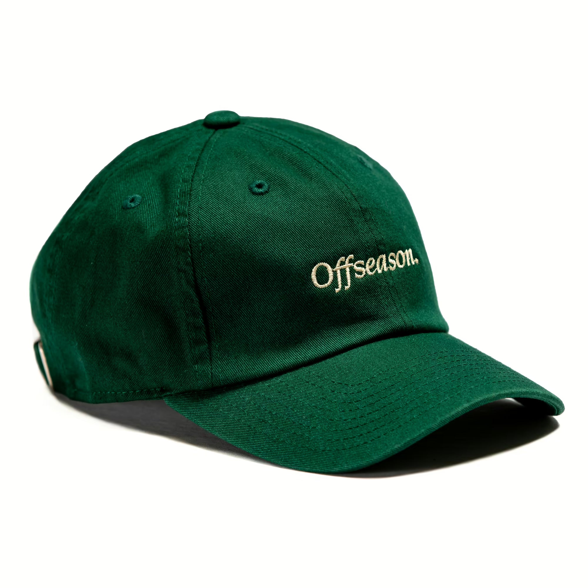 Rex Club | The Rex Club OFFSEASON 23 Slouch is a dark green, 100% cotton cap with "Offseason." embroidered in white on the front, shown from a slight angle. Enjoy comfort and style with this casual fit hat. | Custom Caps | Custom Hats | Team Headwear | UK