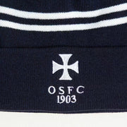 Rex Club | The Rex Club OSFC Beanie is a navy blue knit hat with two white stripes, fleece lining for warmth, and an embroidered white cross above "OSFC 1903. | Custom Caps | Custom Hats | Team Headwear | UK