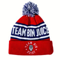 Rex Club | The Rex Club Team Bin Juice Bobble is a red, white, and blue acrylic beanie with a pom-pom, fleece lining, "TEAM BIN JUICE" text on the front, and a circular logo with a cartoon face on the folded brim. | Custom Caps | Custom Hats | Team Headwear | UK
