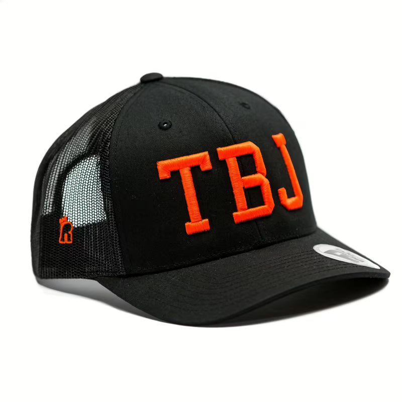 Rex Club | The Rex Club Team Bin Juice hat features a black mesh trucker design with bold flo orange "TBJ" embroidery on the front and a small orange logo on the side, shown against a white background. | Custom Caps | Custom Hats | Team Headwear | UK