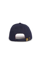 Rex Club | A navy blue Leander Club baseball cap by Rex Club, viewed from the back, features an adjustable strap with a brass buckle and a small opening above the strap—this premium bespoke cap is inspired by classic rowing club style. | Custom Caps | Custom Hats | Team Headwear | UK