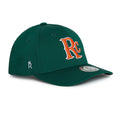 Rex Club | The RC 26 Performance by Rex Club is a green baseball cap featuring an orange and white "RC" logo on the front, a small crowned "R" monogram on the side, and a circular brim sticker—ideal for sports fans. | Custom Caps | Custom Hats | Team Headwear | UK