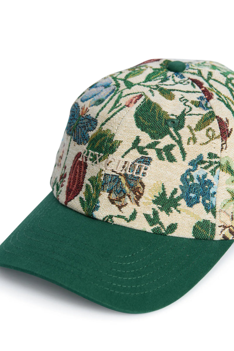Rex Club | The "A New Day" cap by Rex Club features a green brim, cream crown with a blue, red, and green floral tapestry pattern, and "RELAX" embroidered in white—making it a standout bespoke accessory. | Custom Caps | Custom Hats | Team Headwear | UK variant-2