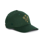 Rex Club | Certainly! Here’s a rewritten sentence incorporating your product data: The Rex Club MTRC – Green cap is a dark green baseball cap made from 100% cotton, featuring gold embroidery of two crossed tennis rackets, “1816,” a small crown, and a fleur-de-lis on the front. Inspired by traditional Manchester Tennis & Racquets Club caps, this piece of club merchandise includes a curved brim and an adjustable strap at the back. | Custom Caps | Custom Hats | Team Headwear | UK