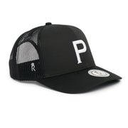 Rex Club | The Rex Club Cornish Pirates - P Trucker is a black cap with a white embroidered "P" on the front, black mesh back panels, and a circular logo patch on the brim. | Custom Caps | Custom Hats | Team Headwear | UK
