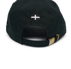 Rex Club | The Rex Club Cornish Pirates - P Slouch is a black baseball cap with an adjustable gold-buckle strap and a black and white cross emblem above the back opening—ideal for Cornish Pirates rugby fans. | Custom Caps | Custom Hats | Team Headwear | UK