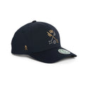 Rex Club | A navy blue St Peter's York baseball cap by Rex Club, featuring golden embroidered symbols and a small "R" on the side. Celebrating the distinguished heritage of St Peter's School, York—recognized as the third-oldest school in the world—the cap displays a round logo sticker on the brim and is positioned at a slight angle. | Custom Caps | Custom Hats | Team Headwear | UK