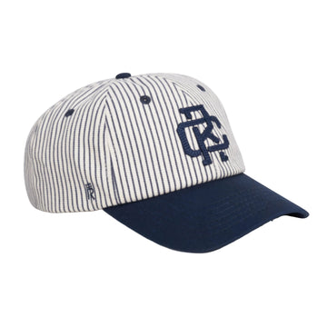 Rex Club | The RC - Baseball Pin - SS26 Navy by Rex Club features vertical navy pinstripes on a white crown, a solid navy brim, and a navy embroidered logo. Made from 100% cotton, it comes in one size for comfortable wear. | Custom Caps | Custom Hats | Team Headwear | UK