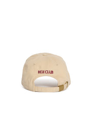 Rex Club | RC 3d 26 - Beige cap from Rex Club, shown from the back, featuring “REX CLUB” in red 3D embroidery above the adjustable strap and buckle. | Custom Caps | Custom Hats | Team Headwear | UK