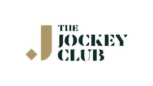 Rex Club | The Jockey Club logo featuring a stylized gold "J" and diamond shape, with the words "THE JOCKEY CLUB" in bold, stencil-style black letters on a white background. | Custom Caps | Custom Hats | Team Headwear | UK