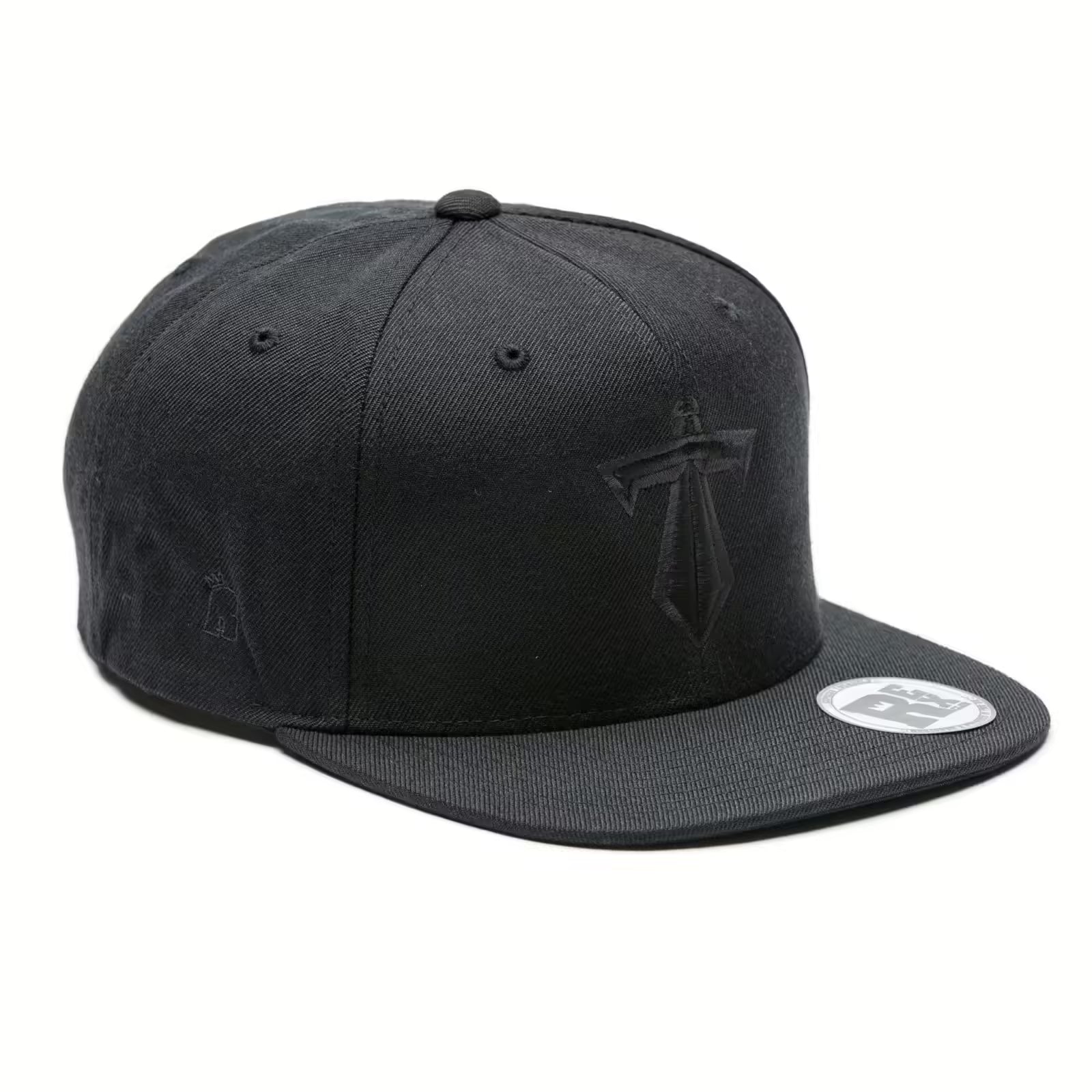 Rex Club | The Rex Club Manchester Titans Snapback is a black, structured baseball cap featuring a flat brim with a round sticker, embroidered front logo, and ventilation eyelets. | Custom Caps | Custom Hats | Team Headwear | UK