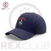 Rex Club | A blue Fylde CC Stretch baseball cap, adorned with the Fylde Cricket Club Poulton emblem of crossed cricket bats and a red rose, is displayed against a white background. The cap appears inside a transparent circle featuring a crown symbol and is accompanied by the text "REX CLUB" at the bottom. | Custom Caps | Custom Hats | Team Headwear | UK