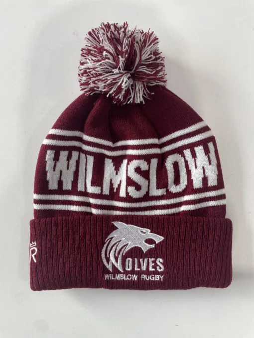 Rex Club | The Wilmslow Wolves RUFC Bobble Hat is maroon and white, featuring a pom-pom on top. It prominently displays the text "WILMSLOW" in large letters, along with "WILMSLOW RUGBY" accompanied by a wolf logo below. | Custom Caps | Custom Hats | Team Headwear | UK